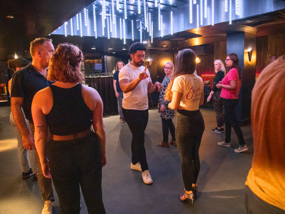 Students building strong Salsa and Bachata foundations at Latin Roots