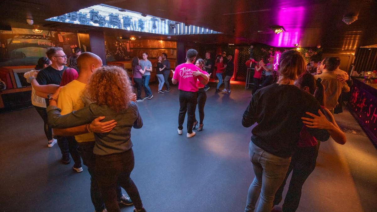 Students social dancing Salsa and Bachata at Latin Roots in Edinburgh
